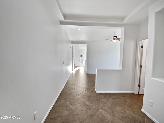 hallway featuring light tile patterned floors