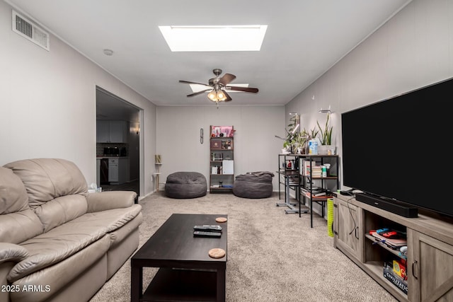 2514 N 22nd Ave, Phoenix, AZ 85009 - living area with a skylight, carpet floors, and a ceiling fan