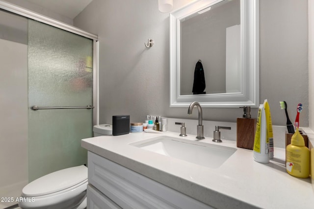 2514 N 22nd Ave, Phoenix, AZ 85009 - full bathroom featuring toilet, vanity, and a shower with shower door