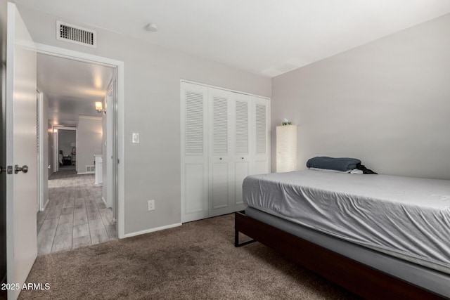 2514 N 22nd Ave, Phoenix, AZ 85009 - carpeted bedroom with a closet and baseboards