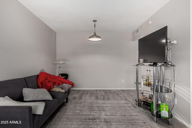2514 N 22nd Ave, Phoenix, AZ 85009 - living room with wood finished floors and baseboards
