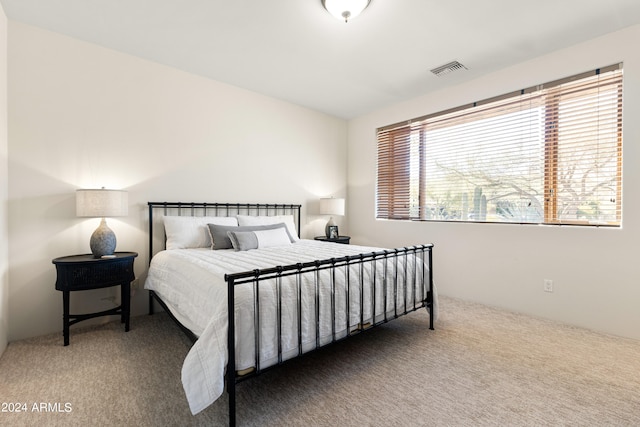 bedroom featuring dark colored carpet