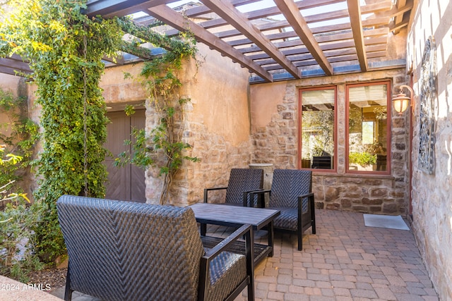 view of patio featuring a pergola