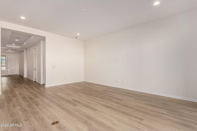 unfurnished room featuring light hardwood / wood-style flooring