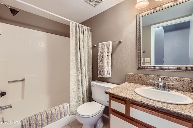 full bathroom featuring toilet, vanity, and shower / bathtub combination with curtain