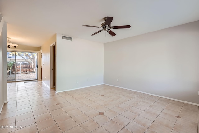 unfurnished room featuring ceiling fan and light tile patterned floors