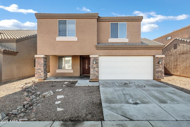 view of front of property with a garage