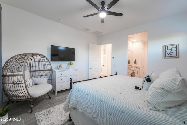 bedroom featuring ensuite bath