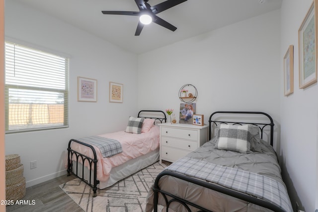 bedroom featuring ceiling fan and light wood-type flooring