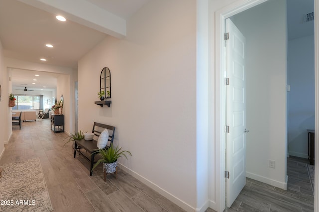 hallway featuring hardwood / wood-style floors