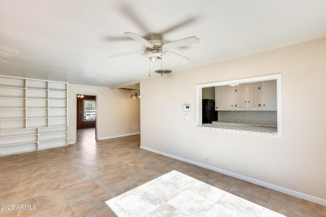 empty room featuring ceiling fan