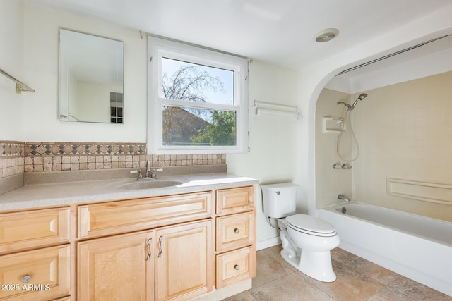 full bathroom featuring vanity, shower / tub combination, tile patterned floors, and toilet