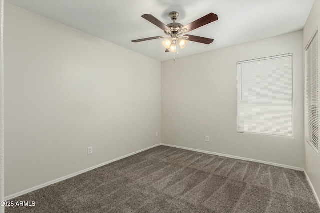 21621 N 48th Pl, Phoenix, AZ 85054 - empty room featuring a ceiling fan, baseboards, and dark colored carpet