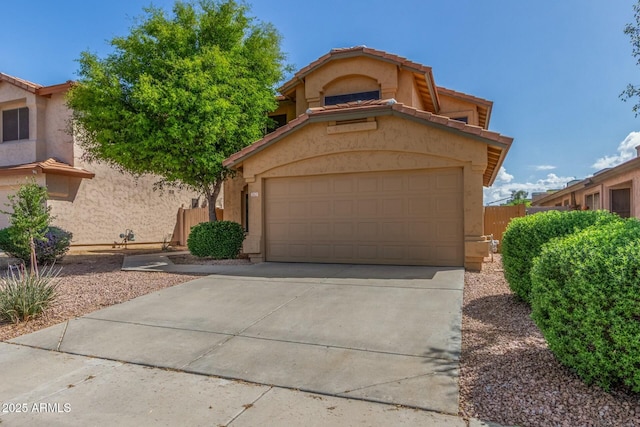 21621 N 48th Pl, Phoenix, AZ 85054 - view of front of property featuring a garage, fence, stucco siding, and concrete driveway