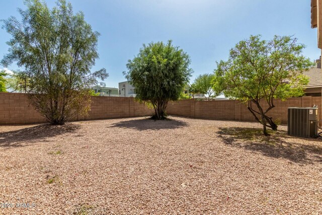 21621 N 48th Pl, Phoenix, AZ 85054 - view of yard with a fenced backyard and cooling unit
