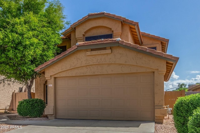21621 N 48th Pl, Phoenix, AZ 85054 - view of front of home featuring fence, stucco siding, concrete driveway, and a tile roof