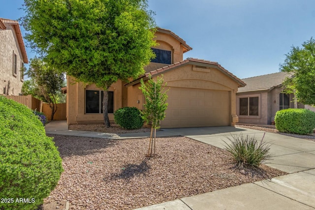 21621 N 48th Pl, Phoenix, AZ 85054 - view of front of house with a garage, fence, stucco siding, a tiled roof, and driveway