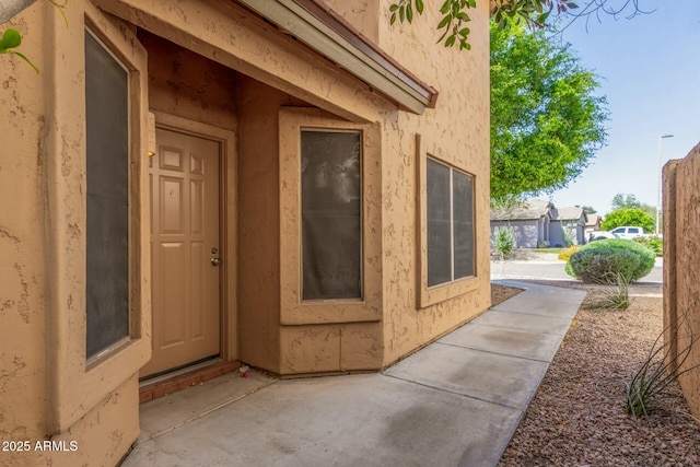 21621 N 48th Pl, Phoenix, AZ 85054 - view of side of property with a patio and stucco siding