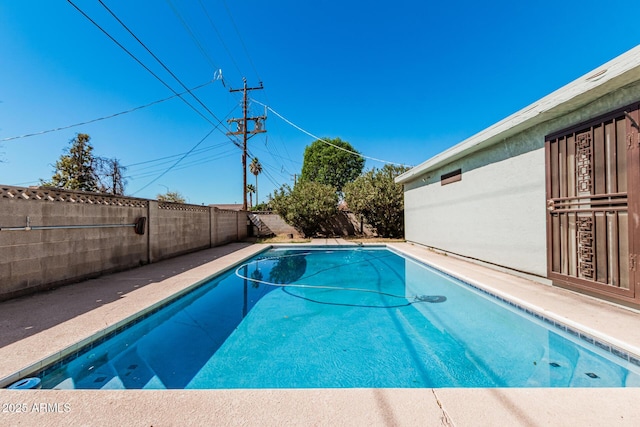 view of pool with a fenced in pool and a fenced backyard