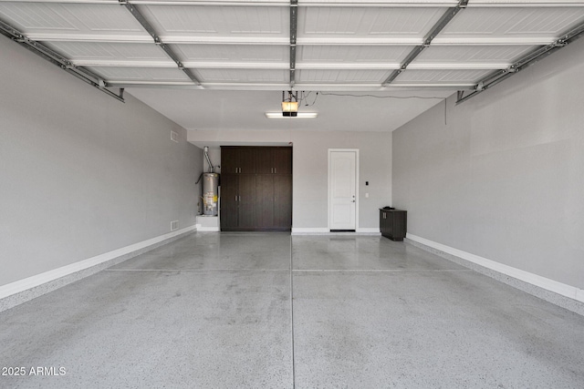 1167 E Knightsbridge Way, Gilbert, AZ 85297 - garage featuring baseboards, a garage door opener, and gas water heater