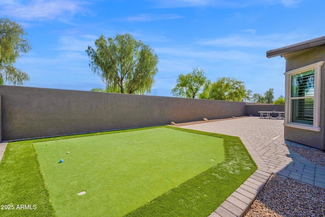 1167 E Knightsbridge Way, Gilbert, AZ 85297 - view of yard featuring a fenced backyard and a patio area
