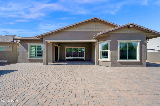 1167 E Knightsbridge Way, Gilbert, AZ 85297 - rear view of house with fence, a patio, and stucco siding