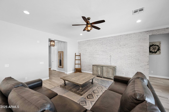 1167 E Knightsbridge Way, Gilbert, AZ 85297 - living room with visible vents, a ceiling fan, baseboards, and wood finished floors