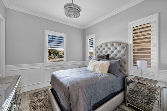 1167 E Knightsbridge Way, Gilbert, AZ 85297 - bedroom with crown molding, wainscoting, and wood finished floors