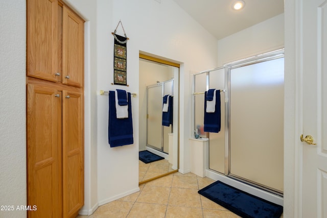 full bath with recessed lighting, tile patterned floors, and a stall shower