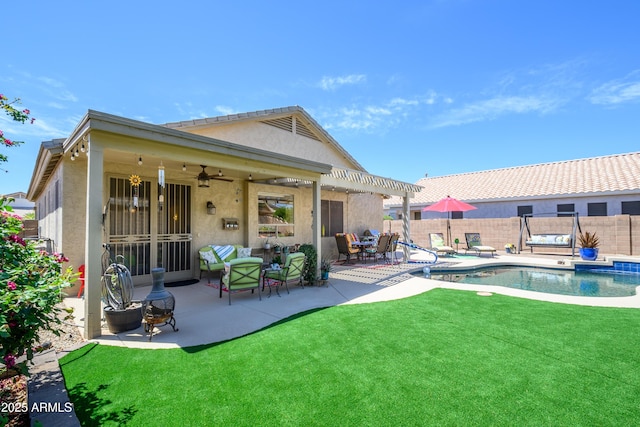 rear view of house featuring a pergola, stucco siding, a fenced backyard, a fenced in pool, and a yard
