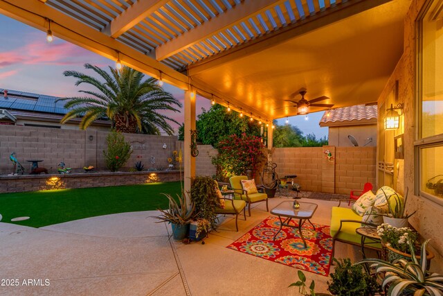 view of patio with a fenced backyard, a pergola, and outdoor lounge area