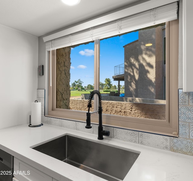 7424 N Via Camello Del Norte Unit 185, Scottsdale, AZ 85258 - kitchen with a sink and dishwashing machine