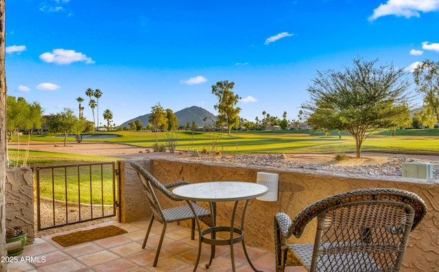 7424 N Via Camello Del Norte Unit 185, Scottsdale, AZ 85258 - view of patio with a mountain view and view of golf course