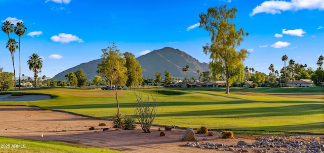 7424 N Via Camello Del Norte Unit 185, Scottsdale, AZ 85258 - surrounding community with a mountain view, view of golf course, and a lawn