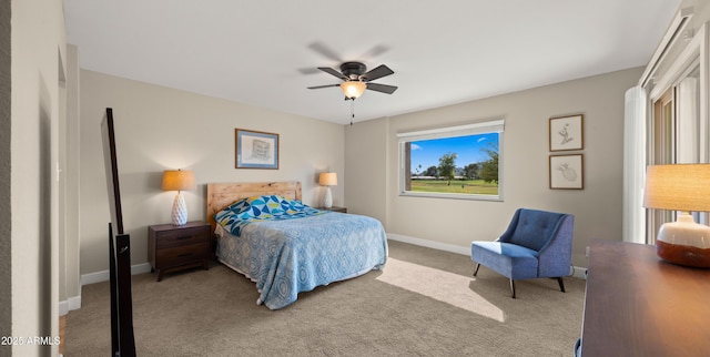 7424 N Via Camello Del Norte Unit 185, Scottsdale, AZ 85258 - bedroom featuring carpet, baseboards, and ceiling fan