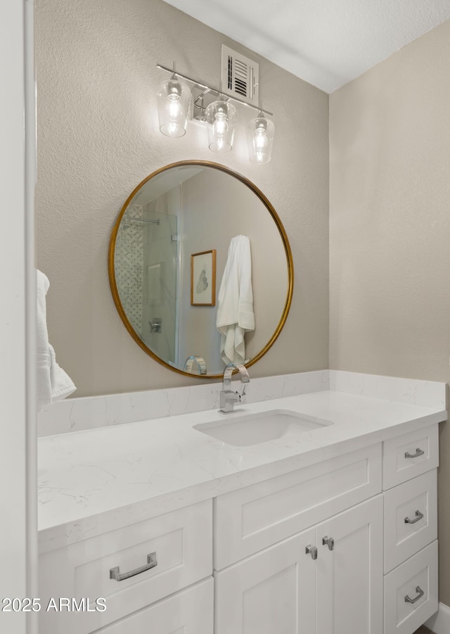 7424 N Via Camello Del Norte Unit 185, Scottsdale, AZ 85258 - full bath featuring vanity and a shower with door