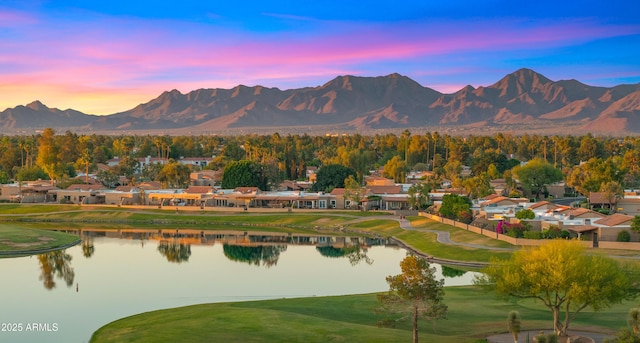 7424 N Via Camello Del Norte Unit 185, Scottsdale, AZ 85258 - view of mountain backdrop featuring a large body of water, a local golf course, and nearby suburban area