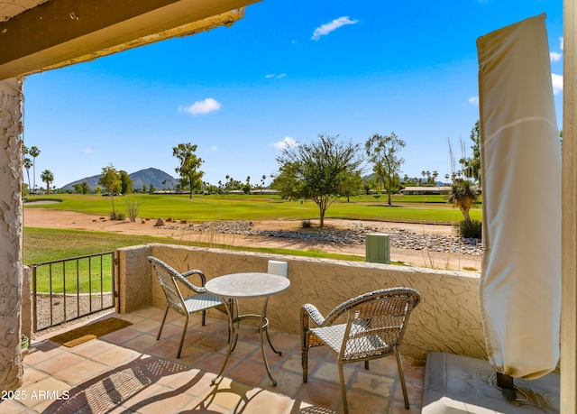 7424 N Via Camello Del Norte Unit 185, Scottsdale, AZ 85258 - view of patio / terrace with view of golf course and a mountain view