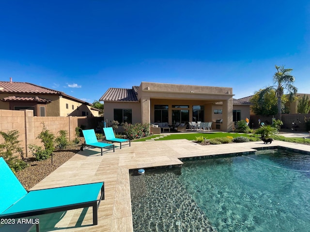 2308 E Dry Wood Rd, Phoenix, AZ 85024 - rear view of house with outdoor lounge area, stucco siding, fence, and a patio