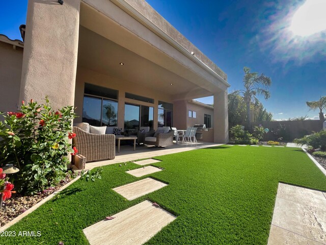 2308 E Dry Wood Rd, Phoenix, AZ 85024 - view of yard with an outdoor living space and a patio area