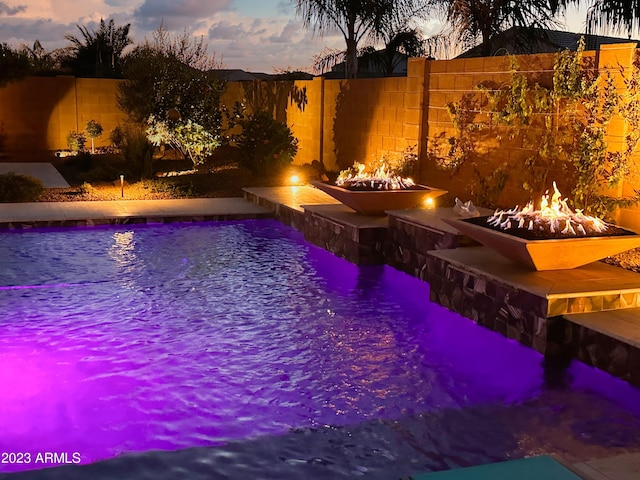 2308 E Dry Wood Rd, Phoenix, AZ 85024 - view of pool featuring a fire pit and a fenced backyard