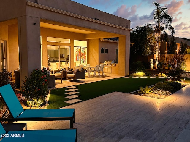 2308 E Dry Wood Rd, Phoenix, AZ 85024 - rear view of property with a patio area, outdoor lounge area, stucco siding, and a yard