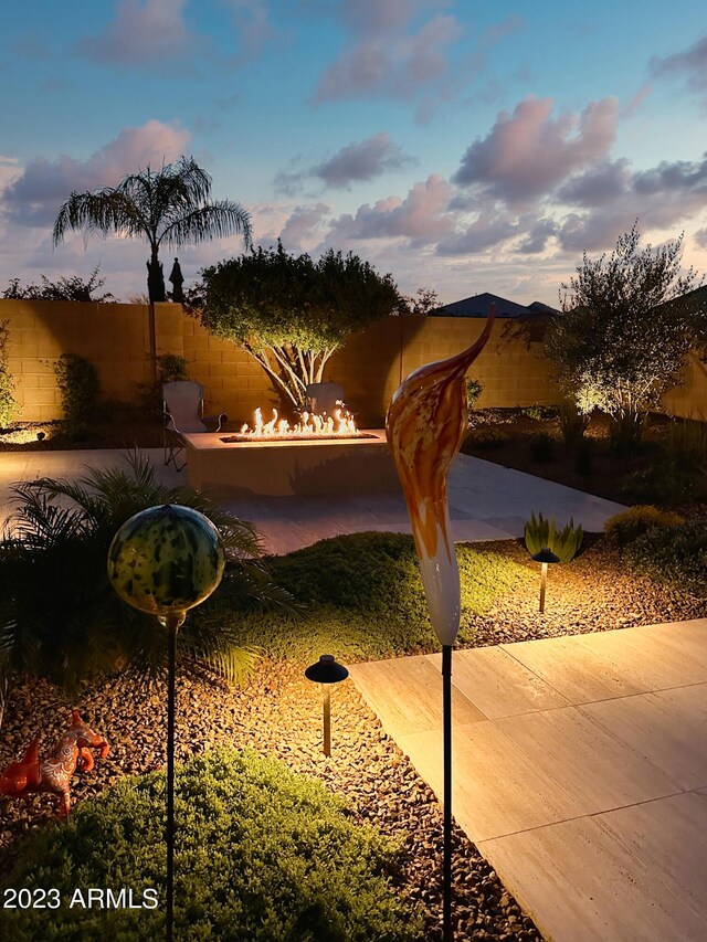 2308 E Dry Wood Rd, Phoenix, AZ 85024 - view of home's community with a patio, an outdoor fire pit, and fence