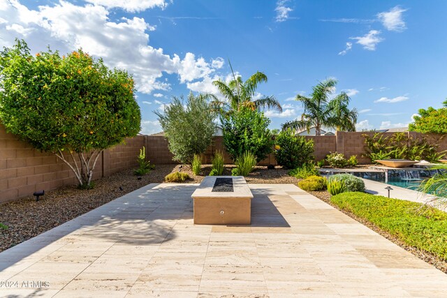 2308 E Dry Wood Rd, Phoenix, AZ 85024 - view of patio / terrace with an outdoor fire pit and a fenced backyard