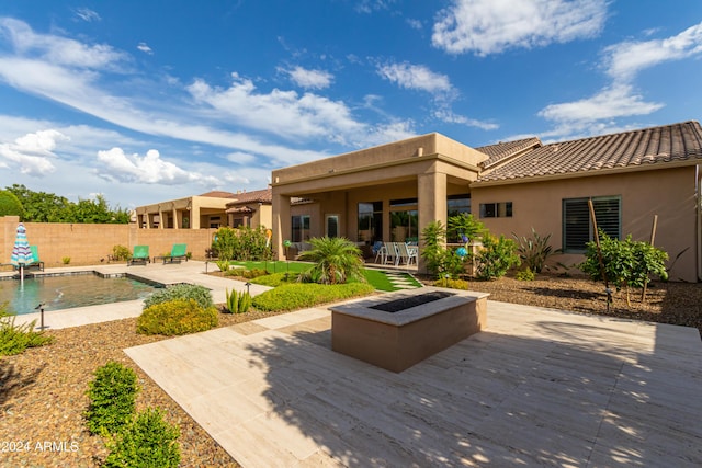 2308 E Dry Wood Rd, Phoenix, AZ 85024 - back of house with stucco siding, fence, a patio area, and a tiled roof