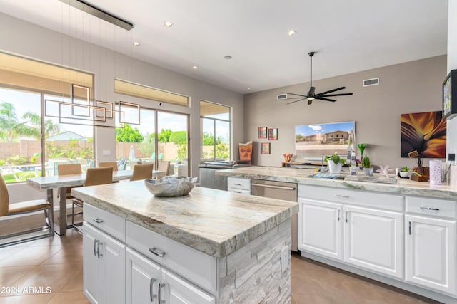 2308 E Dry Wood Rd, Phoenix, AZ 85024 - kitchen featuring a sink, stainless steel dishwasher, a center island, light tile patterned floors, and recessed lighting