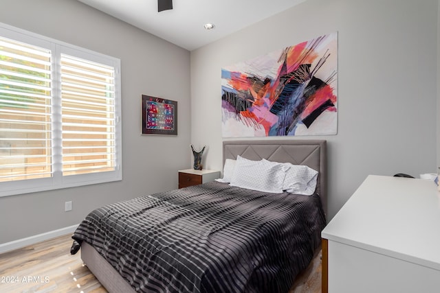 2308 E Dry Wood Rd, Phoenix, AZ 85024 - bedroom featuring wood finished floors, multiple windows, baseboards, and recessed lighting