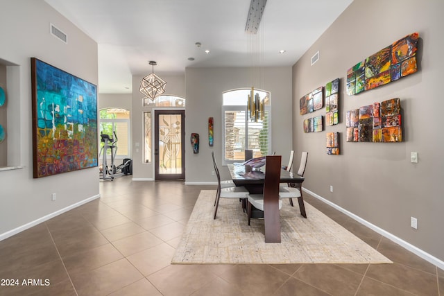 2308 E Dry Wood Rd, Phoenix, AZ 85024 - dining area with tile patterned flooring, plenty of natural light, a chandelier, baseboards, and recessed lighting