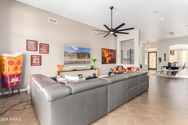 2308 E Dry Wood Rd, Phoenix, AZ 85024 - living room with light tile patterned floors, ceiling fan, vaulted ceiling, and recessed lighting