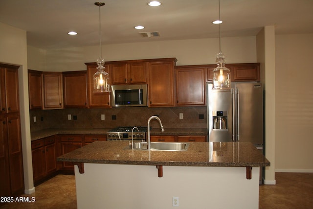 15387 W Columbine Dr, Surprise, AZ 85379 - kitchen featuring tasteful backsplash, a sink, a breakfast bar, stainless steel appliances, and visible vents